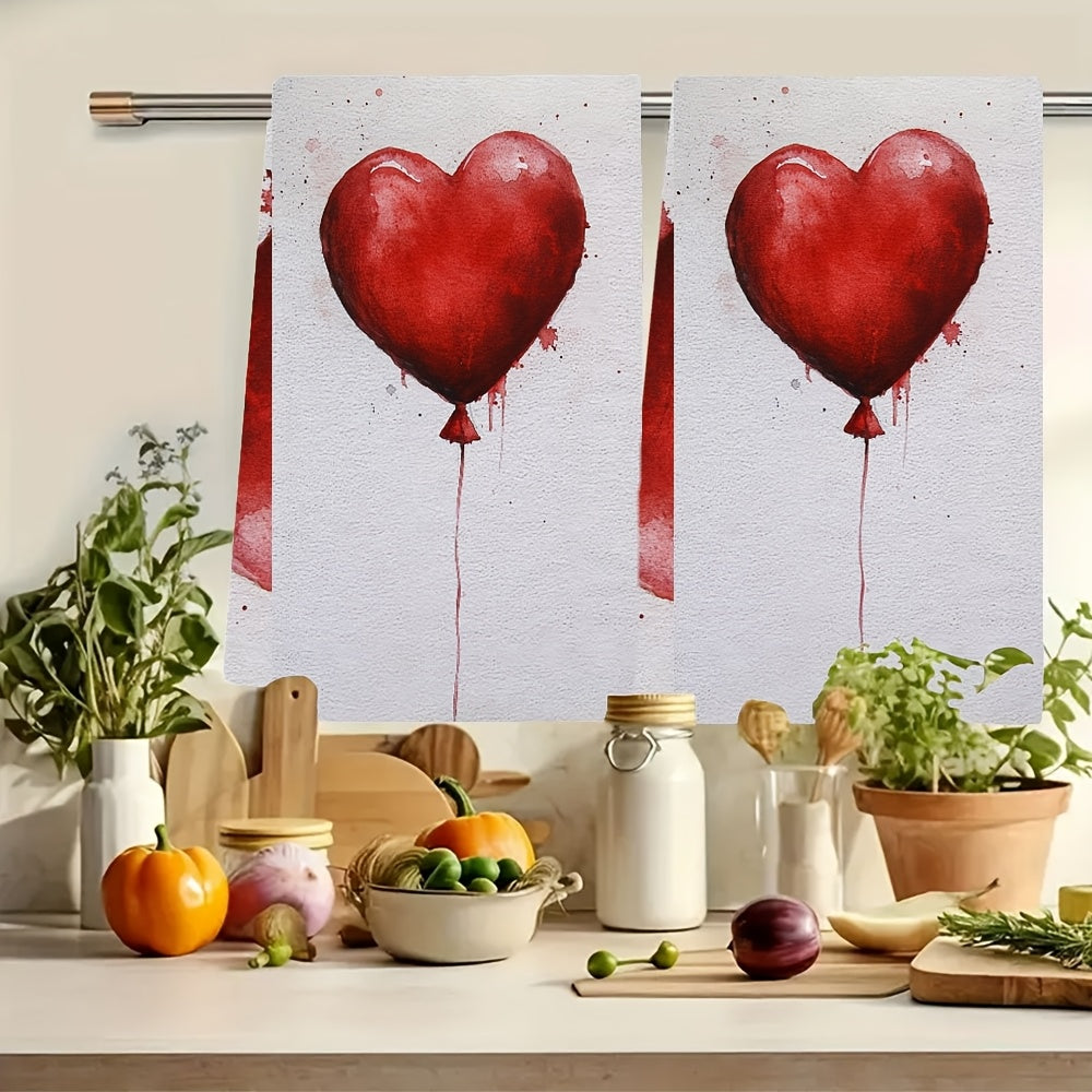 Two pieces of ultra soft kitchen towels featuring a Valentine's heart balloon design. These highly absorbent and machine washable dish hand towels are contemporary red on white decor and measure 40.64x60.96 cm. A must-have addition to your kitchen!