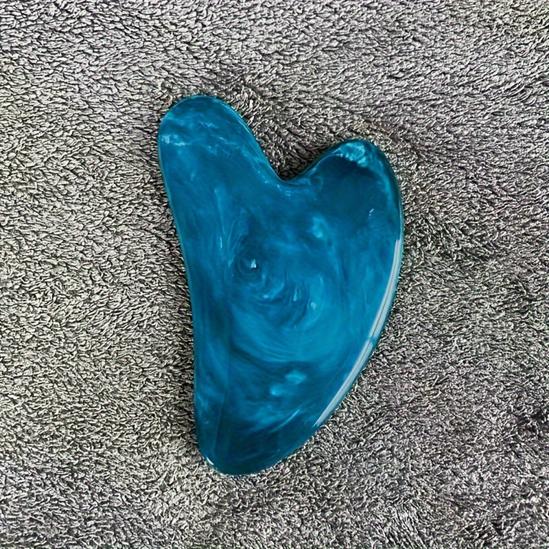 Heart-shaped resin Gua Sha tool for facial and full body hair removal, high-quality for beauty salon use.