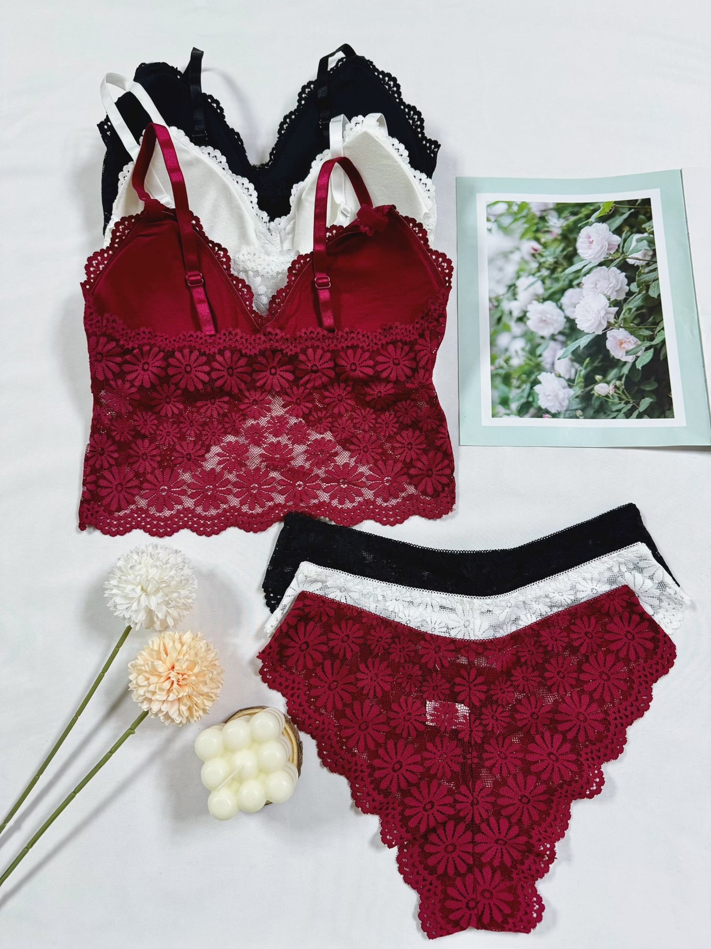 Sexy maroon lingerie set includes bra and matching panties with floral lace design and intricate pattern. Nylon/elastane blend, machine washable. Ideal for teens and special occasions.