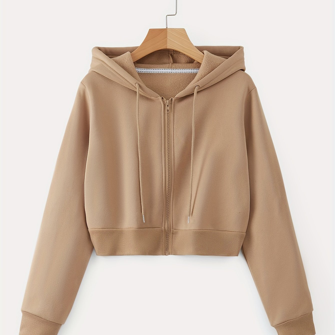 Spring and fall women's cropped drawstring hoodie with long sleeves.