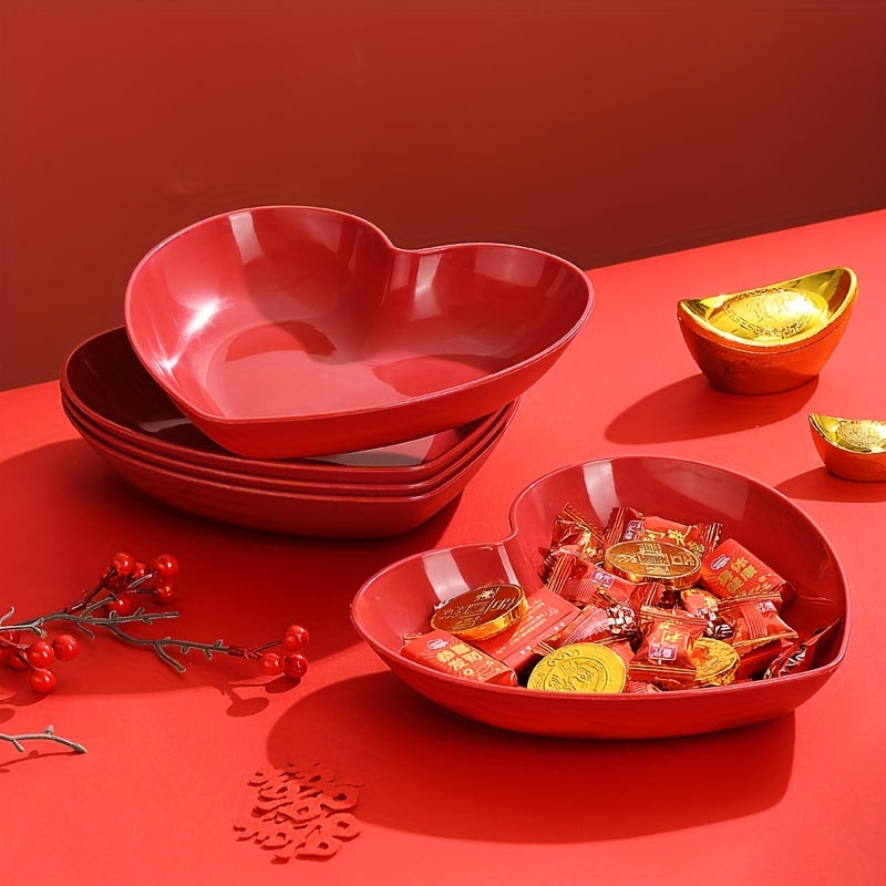 Heart-shaped plastic plates for weddings in sets of 4 or 8. Decorative red serving dishes for snacks, salads, and candy. Versatile party platters for all seasons.