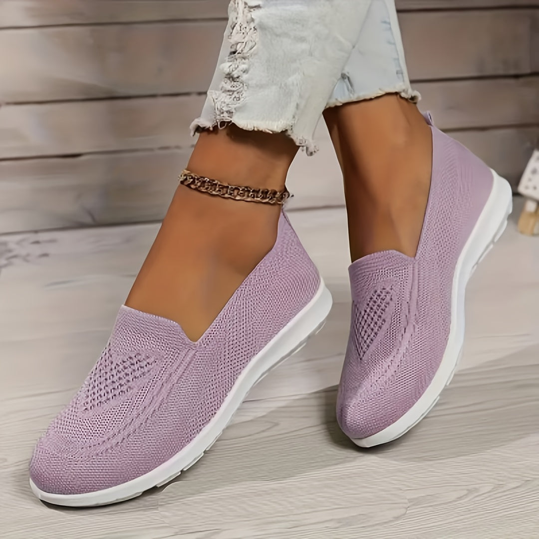 Women's slip-on sneakers are lightweight and breathable with PVC sole and fabric lining. Perfect for all seasons, available in multiple colors.