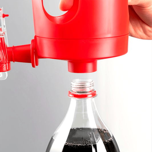 Durable plastic manual bottle inverter for mess-free pouring from soda and water bottles.