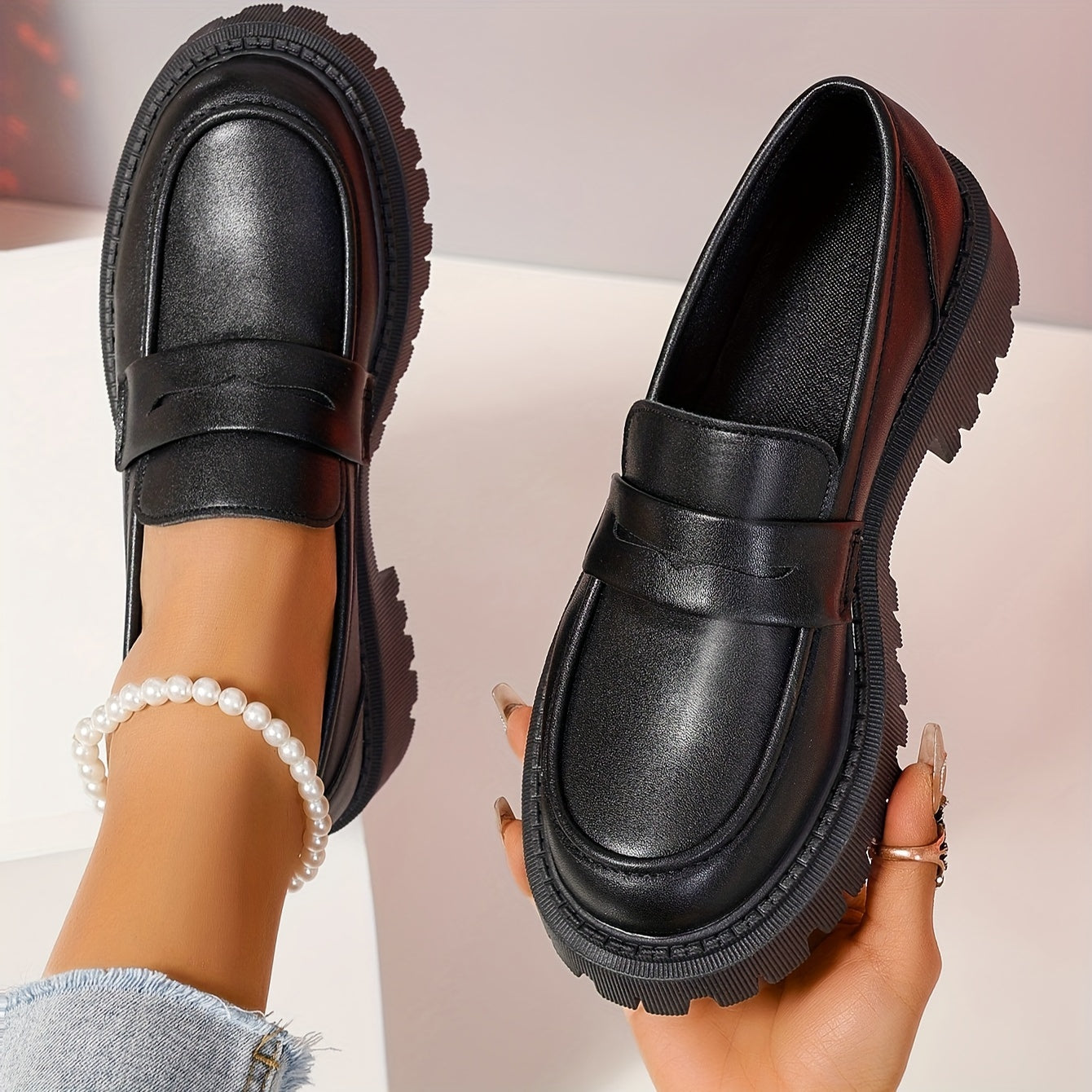 Platform loafers for women in a solid color, featuring a preppy fashion style and offering comfort.