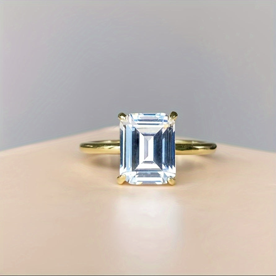 This stunning 925 Sterling Silver ring features a rectangular Cubic Zirconia stone, exuding elegance and luxury. It is perfect for both casual wear and gifting, with its simple yet sophisticated golden design. The simulated diamond comes in sizes of 1CT