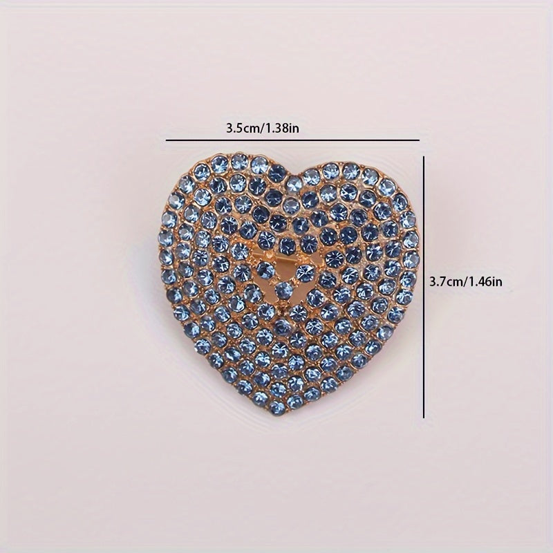 Heart-shaped brooch embellished with sparkling rhinestones - a stylish lapel pin for women's attire, perfect for adding charm to dresses, coats, sweaters, and corsages.