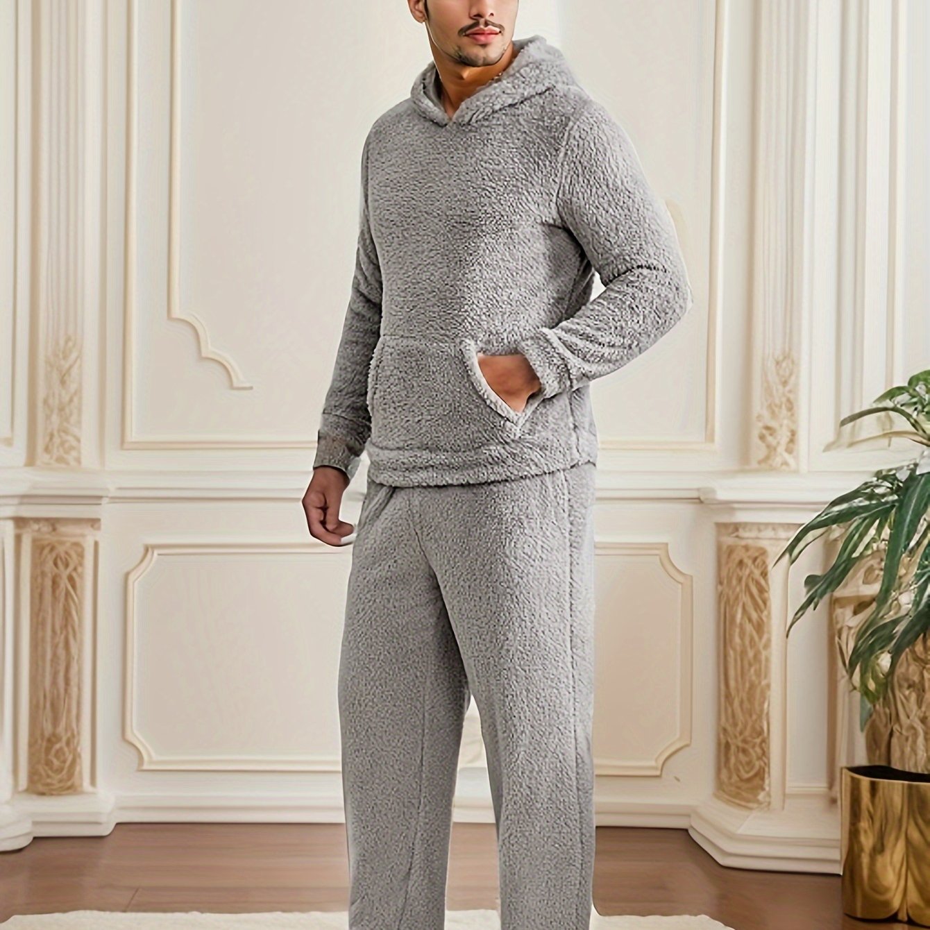 Cozy Men's Hooded Pajama Set made of plush fleece, with pockets and machine washable for winter sleepwear.