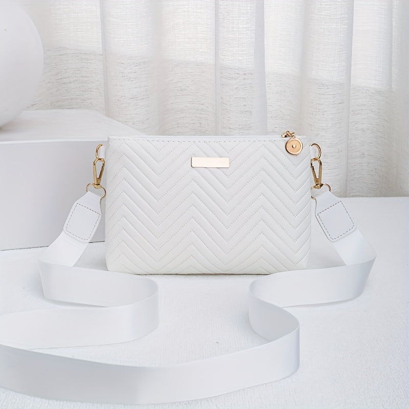 Stylish wave pattern crossbody bag with exquisite hardware and solid color versatility.