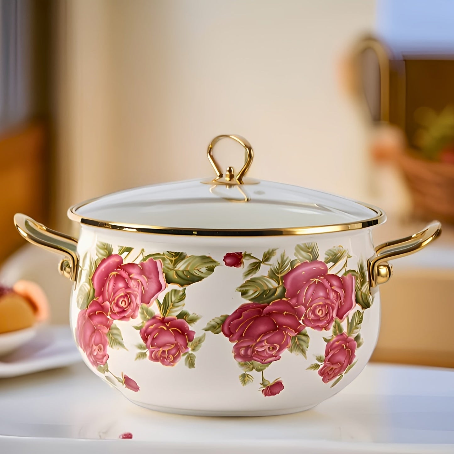 Luxurious stockpot with gold handle and lovely rose flower enamel design. Comes with a durable glass lid and is offered in four different sizes. Perfect for high-end cooking in your home or outdoor kitchen.