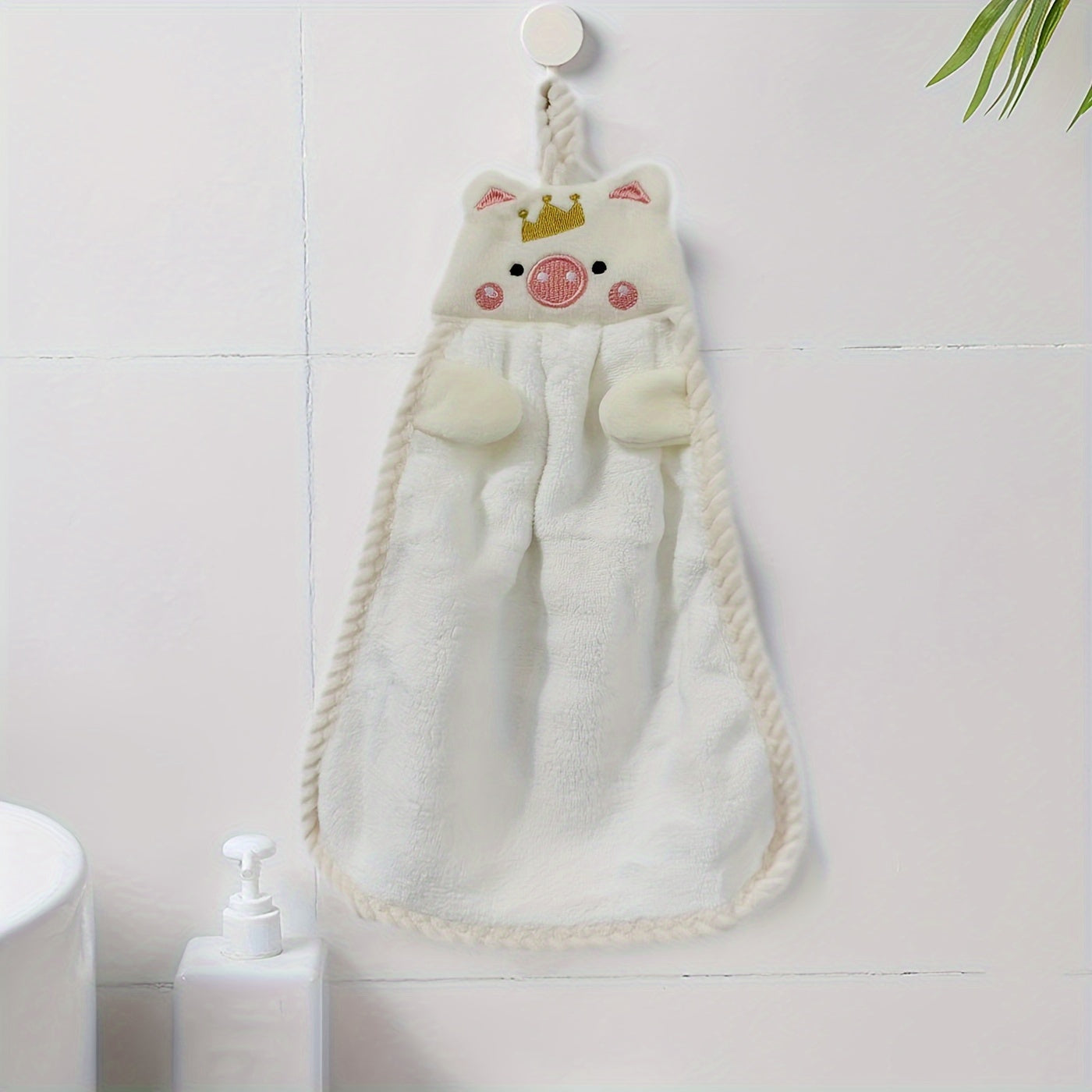 Adorable pig-shaped hand towel made of ultra-soft, absorbent polyester. Perfect for home use and drying dishes.