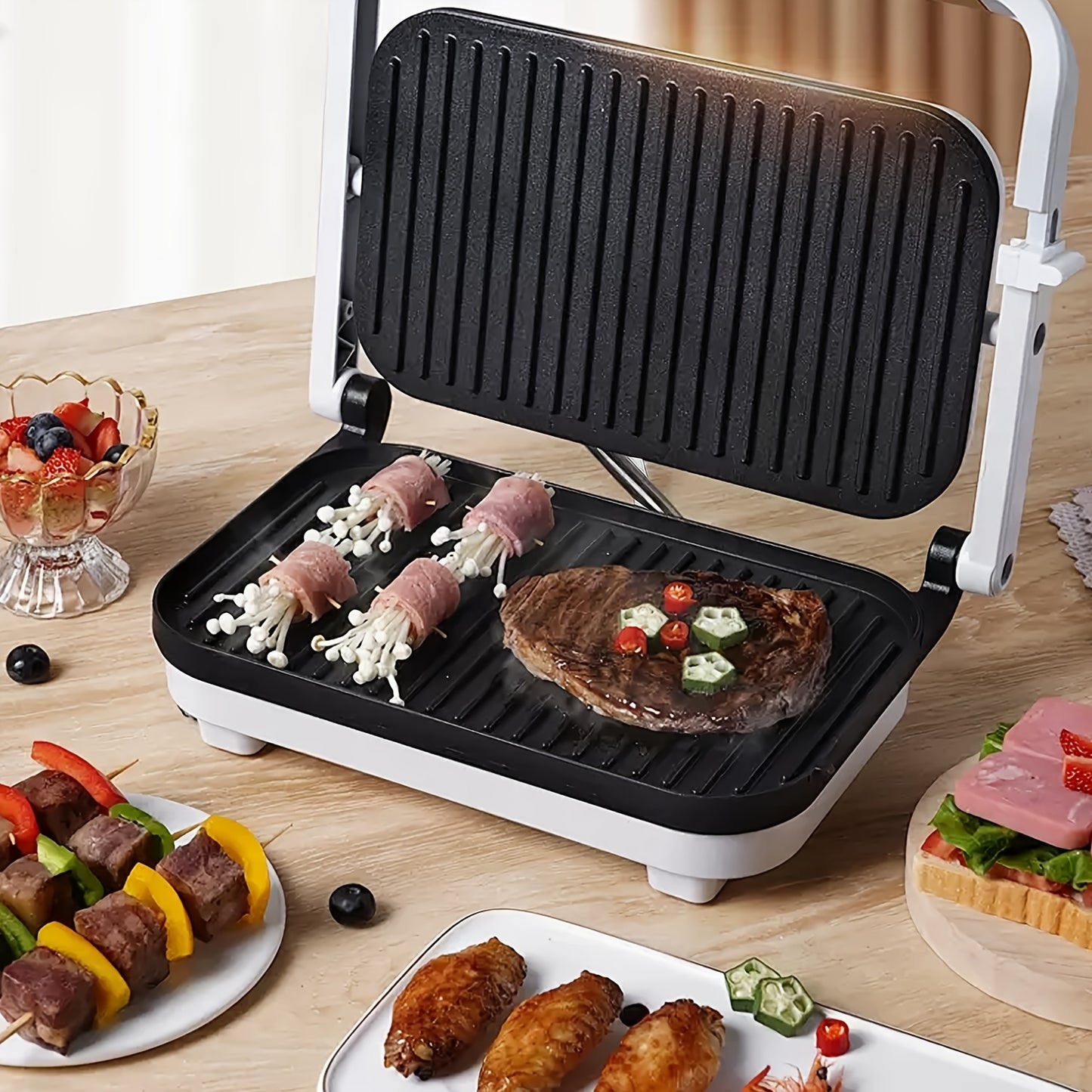 Single electric indoor grill with nonstick grids, locking lid, and 1100-1300W power for various dishes