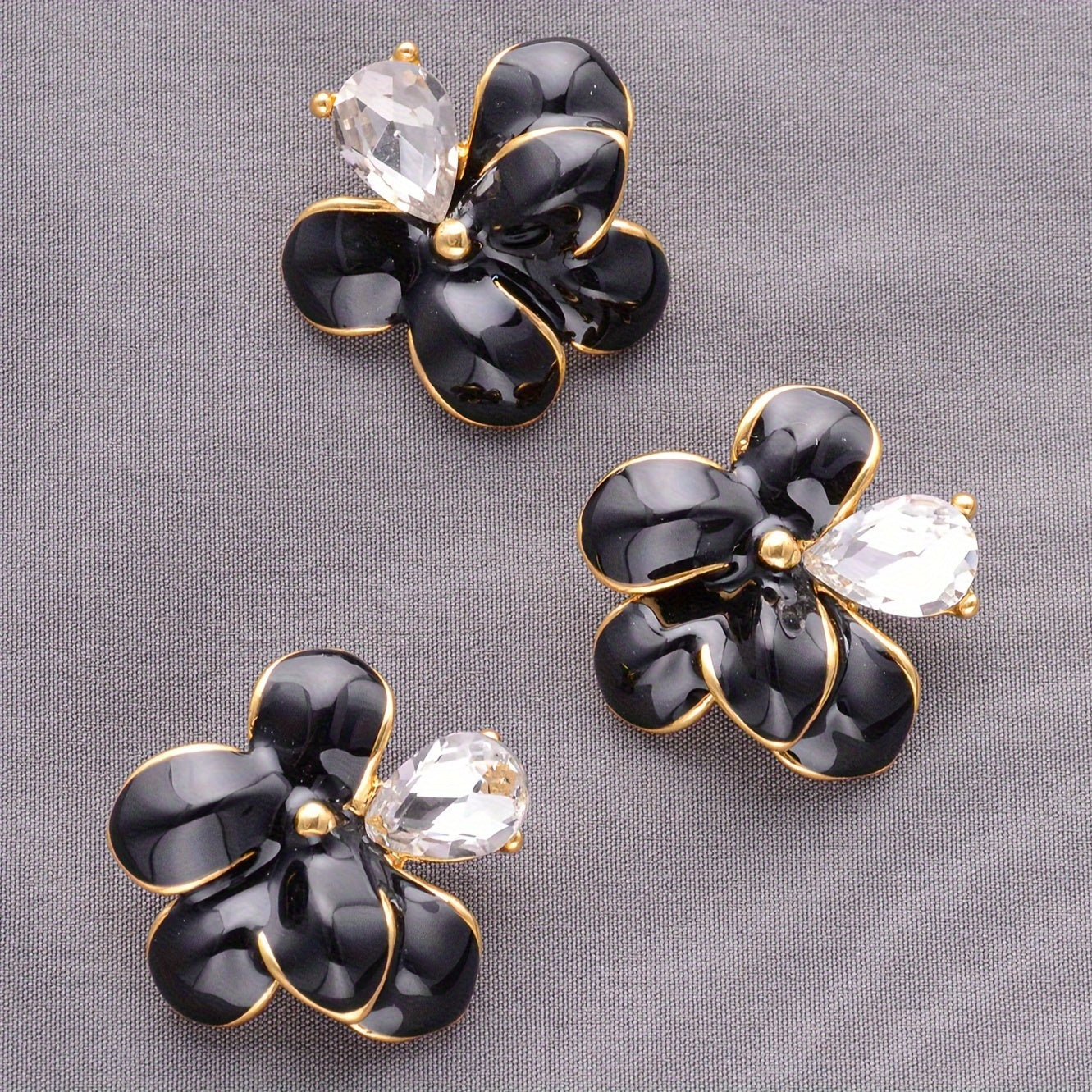 Set of four elegant alloy flower brooch pins, perfect for adding a decorative touch to shirts, sweaters, coats, and more. Use them to accessorize handbags, gift boxes, shoes, and bouquets for a stylish and personalized look.