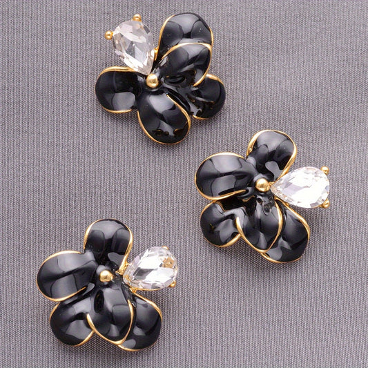 Set of four elegant alloy flower brooch pins, perfect for adding a decorative touch to shirts, sweaters, coats, and more. Use them to accessorize handbags, gift boxes, shoes, and bouquets for a stylish and personalized look.