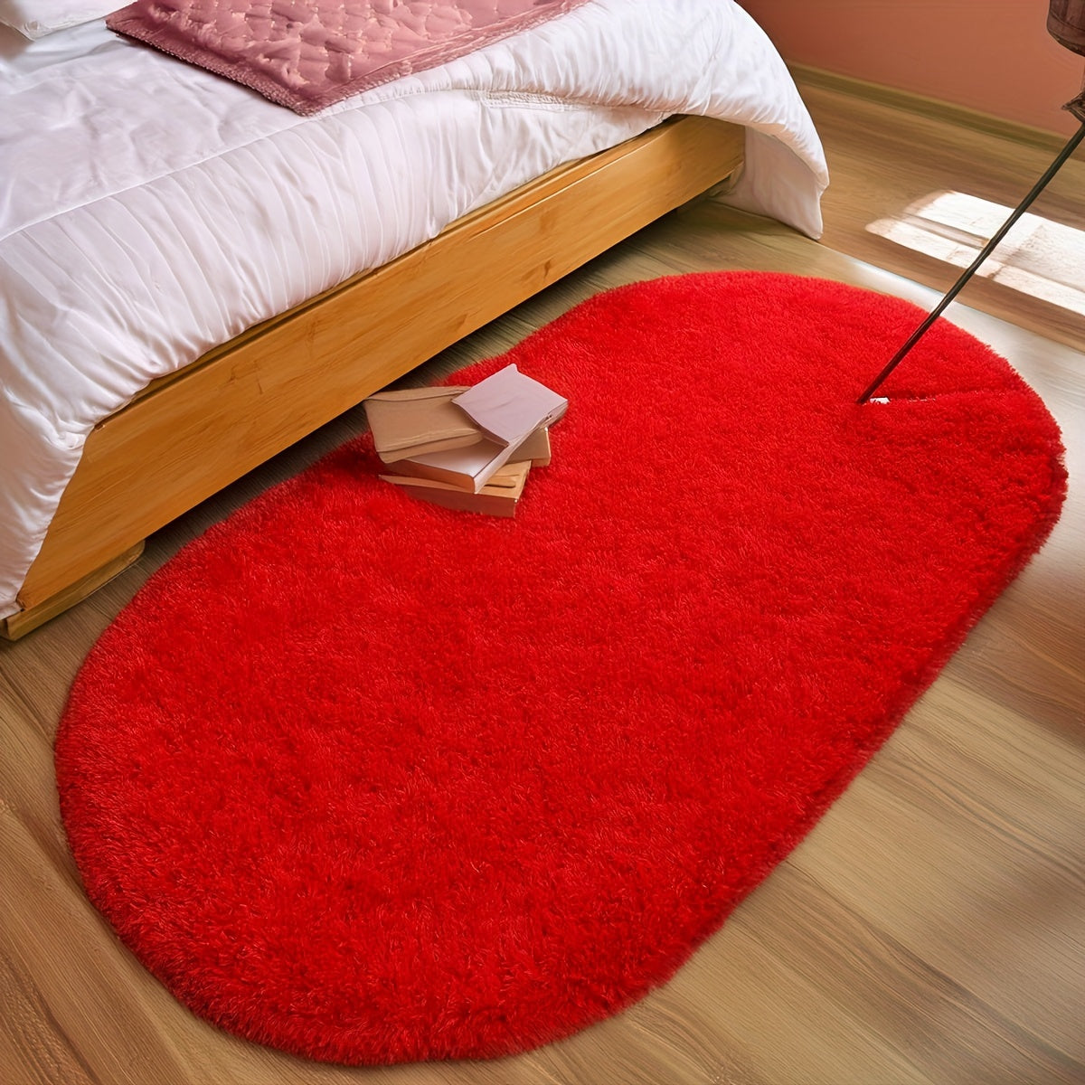 Soft and fluffy oval shaggy area rug, perfect for bedroom or living room. Made with skin-friendly thickened sponge and tufted polyester material. Durable and easy to maintain. Adds decorative touch to indoor spaces such as sofa, bedside, playroom, or