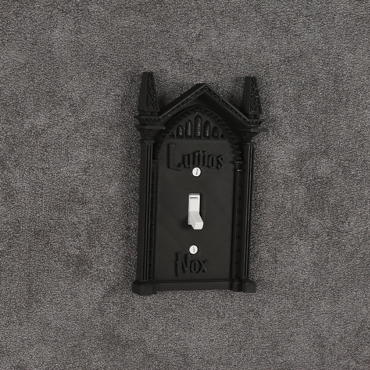 Easy-install 3D printed light switch cover for Halloween and holiday decor; no batteries needed. Unique black wall art for home, Halloween decorations.