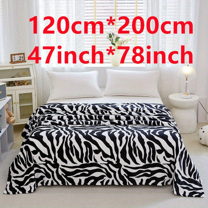 Zebra Patterned Blanket, Luxuriously Soft Throw Blanket Ideal for Snuggling Up on the Couch, Sofa, Office, Bed, Camping or Travel. The perfect multi-purpose gift blanket that can be used in all seasons.