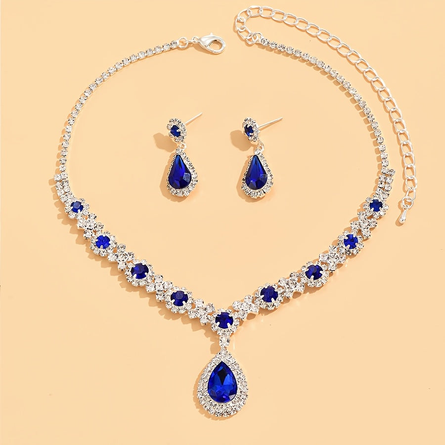 Vintage Elegant Jewelry Set: Stunning Synthetic Teardrop Rhinestone Necklace and Earrings in Silver Plated Copper. Featuring a Heart Theme and December Birthstone, this set is perfect for both Daily Wear and Party Occasions. Makes a romantic Valentine's