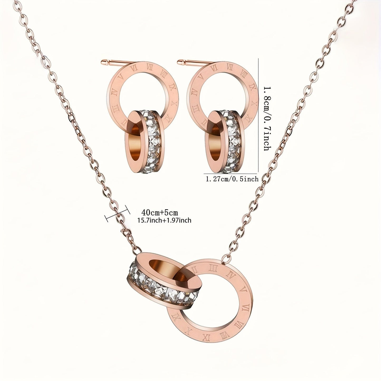 This elegant stainless steel necklace and earrings set features a stylish double-loop Roman numeral engraving. Perfect for daily wear, special occasions, or as a thoughtful gift for a lady. Set includes three pieces.