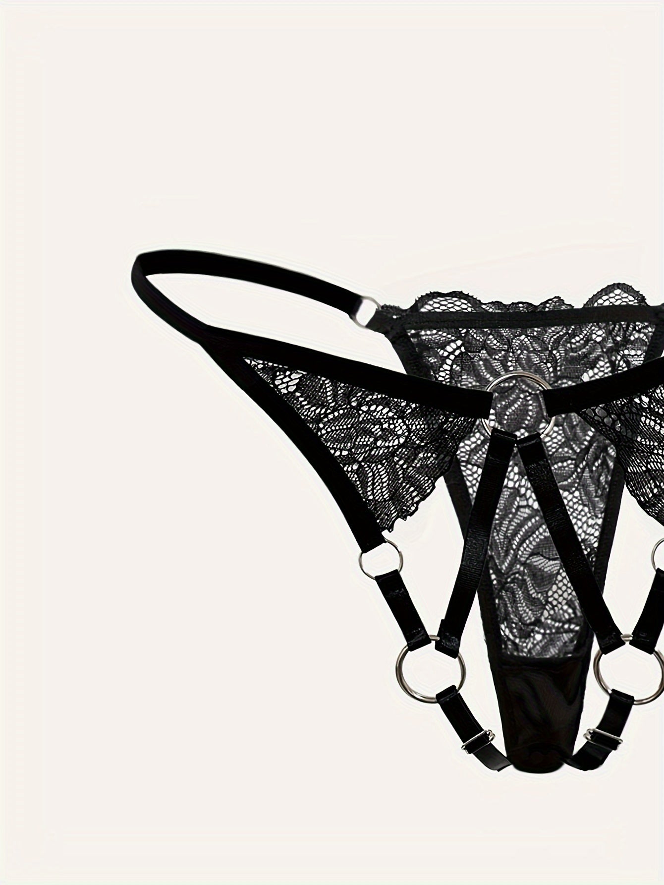 Lace thong with metal ring and see-through design