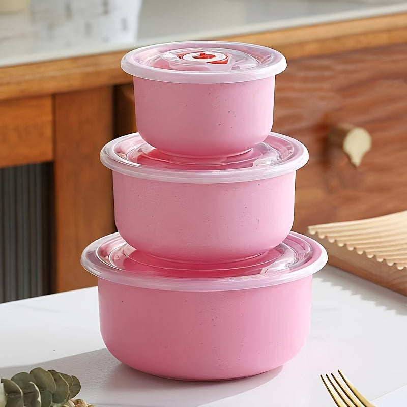 Set of three food storage containers made from wheat straw material, featuring flip top lids. Versatile, eco-friendly, hand wash recommended, microwave-safe, round bowls with sealable lids for preserving food.