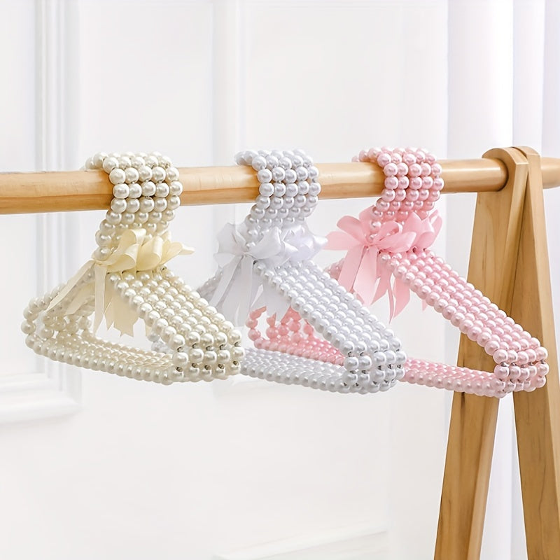 Set of 4 Elegant Pearl Hangers - Ideal for Children's Outfits & Clothing Display, Made of Strong Plastic