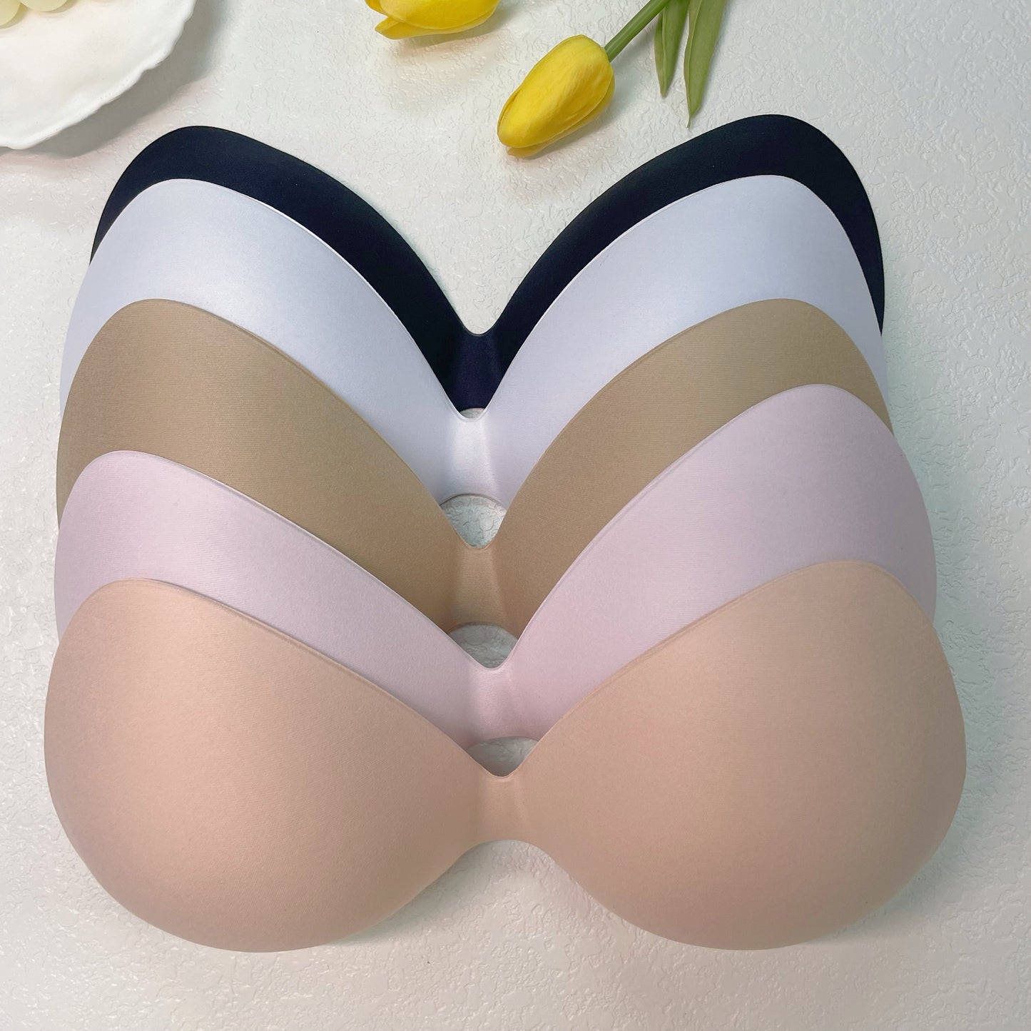 Reusable solid bra insert pads for enhancing chest, invisible and anti-convex. Ideal for women's lingerie and underwear.