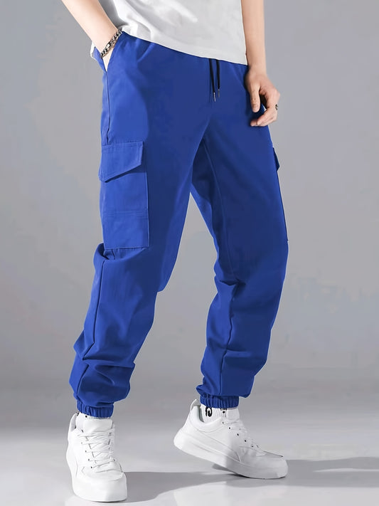 Men's casual joggers made of 100% polyester with a solid color, all-season, non-stretch fabric in a regular fit with pockets.