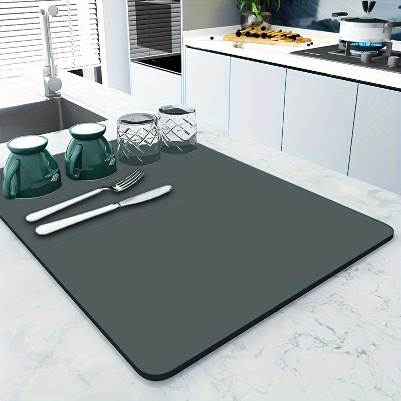 One piece of Super Absorbent Anti-slip Dish Drying Mat in Coffee color. This large kitchen mat is perfect for draining and drying dishes quickly. Also suitable for use in the bathroom as a quick-dry drain pad. Essential kitchen supplies.