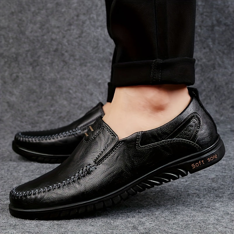 Men's black loafers with split leather upper, soft sole, and casual style suitable for all seasons. Features PU inner lining and rubber outsole.