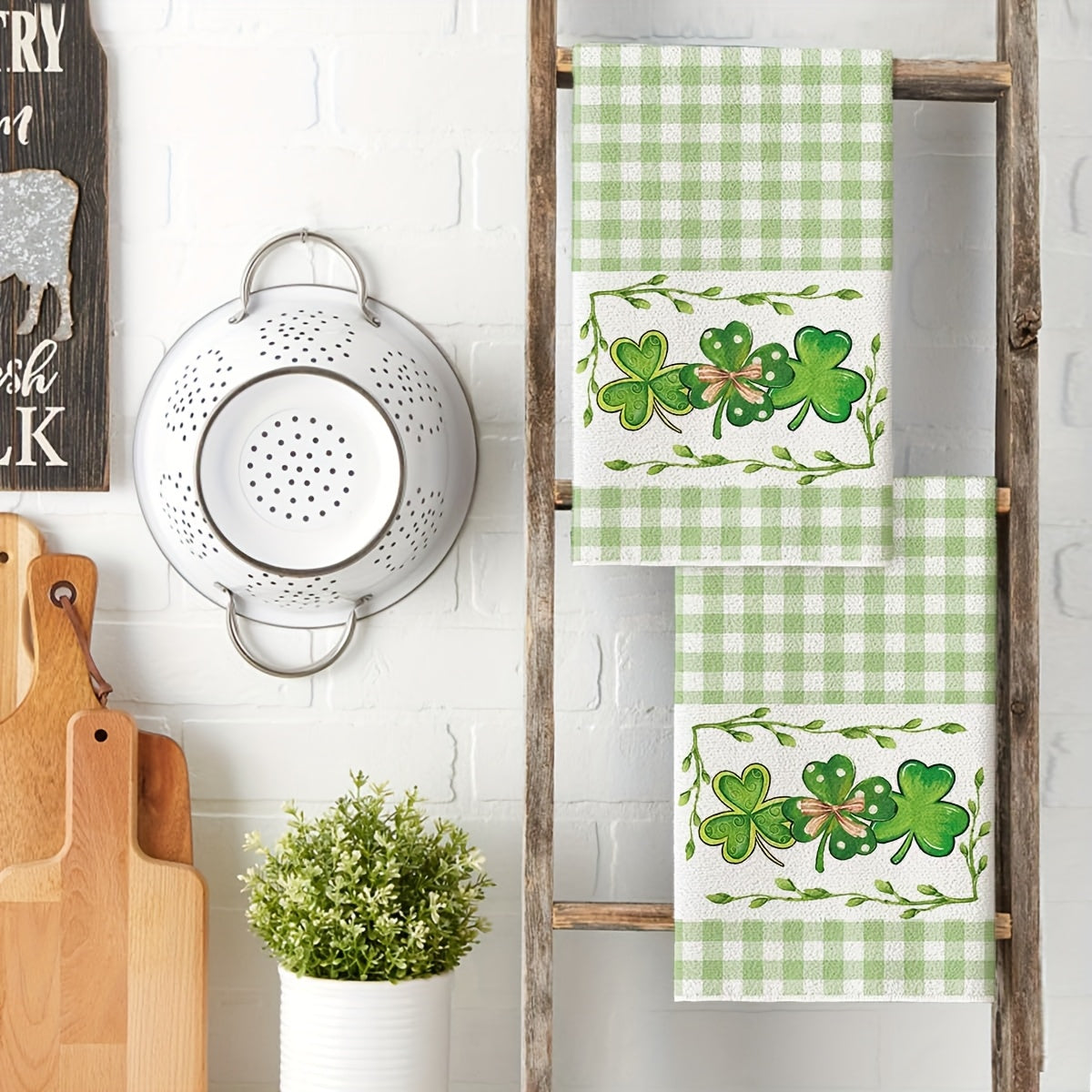 Two Buffalo Check Clover Kitchen Towels perfect for St. Patrick's Day festivities, sized at 40.64X60.96 cm. These Farmhouse-inspired hand towels add a touch of festive decor to your home.