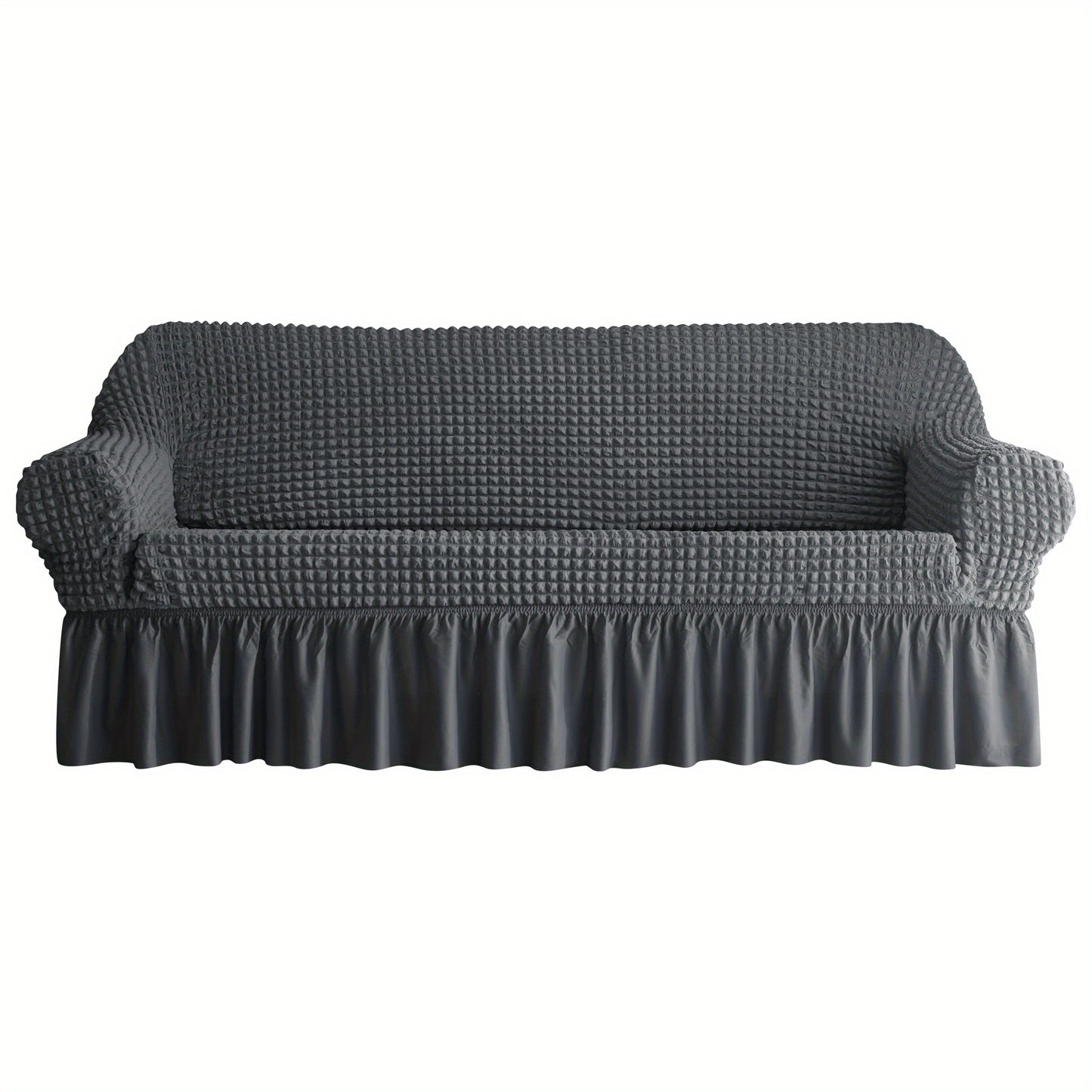 Non-slip elastic sofa cover with skirt for home decor.