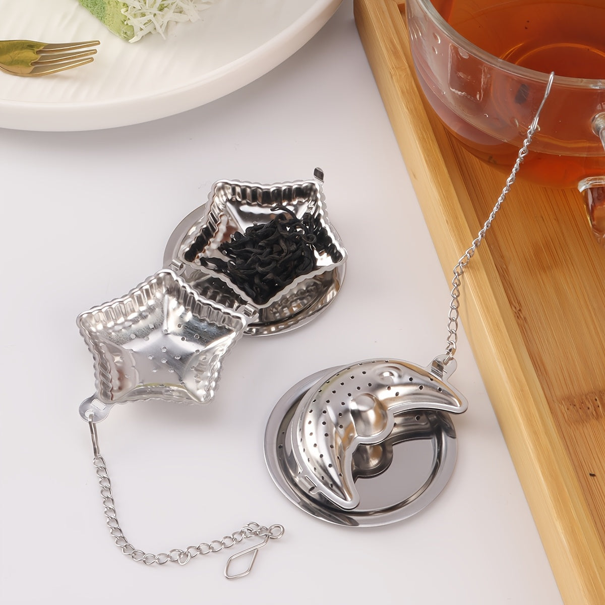 Set of 1 Stainless Steel Hanging Cup Filter Tea Ball with Tray, Available in Heart, Star, and Moon Shapes. Perfect for Ramadan Tea Time. These Creative Tea Balls in Various Shapes are Ideal for Office, Kitchen, Baking, and Special Occasions like Ramadan