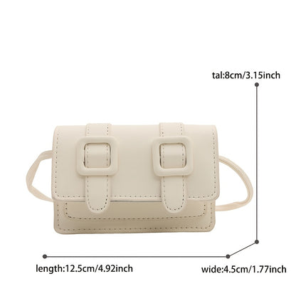 Women's fashion mini crossbody bag in white/black with buckle closure and polyester lining.