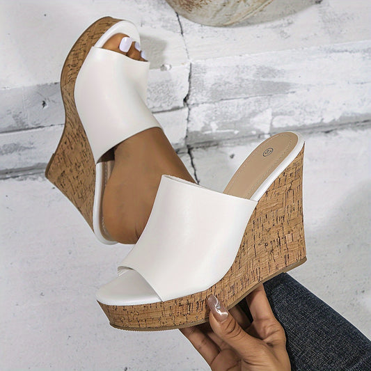 Stylish slip-on wedge sandals with open peep toe design, perfect for summer fashion.