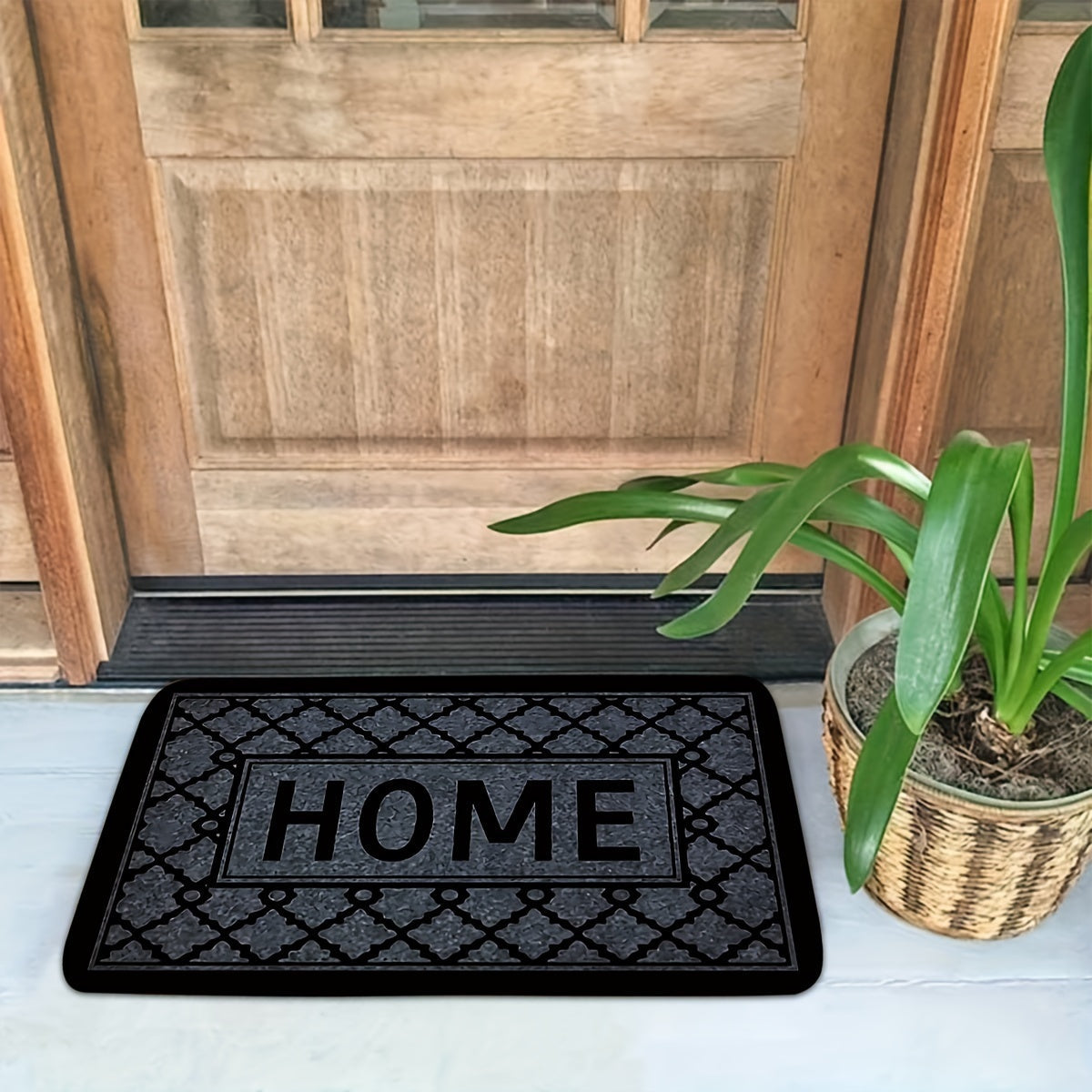 This kitchen flooring mat features a striking black foam design with irregular stripes and the word "HOME" pattern. Made of soft, thick flannel material, this non-slip mat is constructed from 1.2 foam sponge, making it ideal for bathroom and indoor