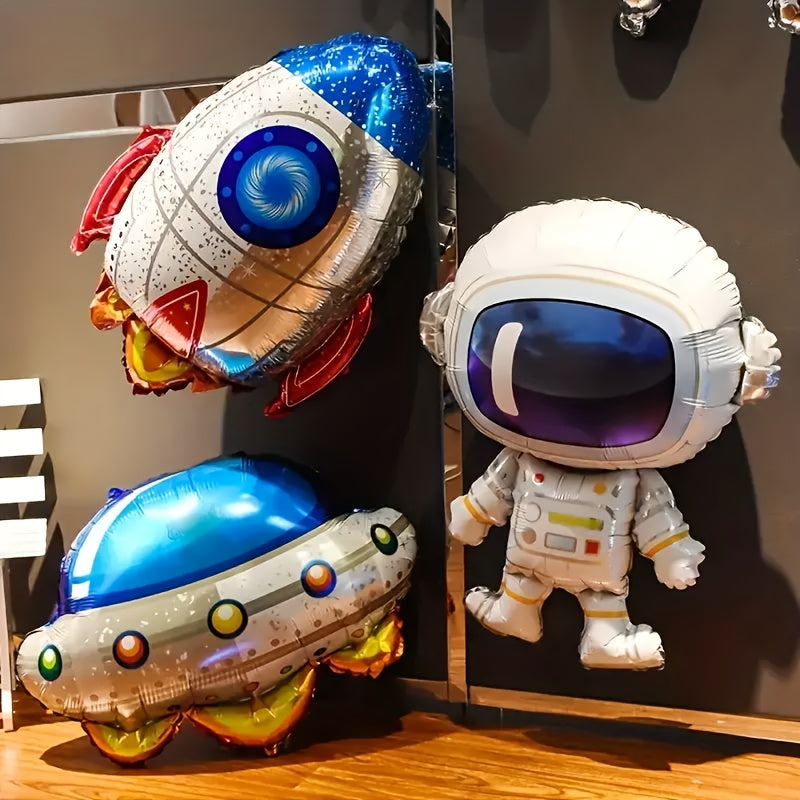 Large space balloons with astronaut, rocket, and UFO designs for birthdays and space party decorations.