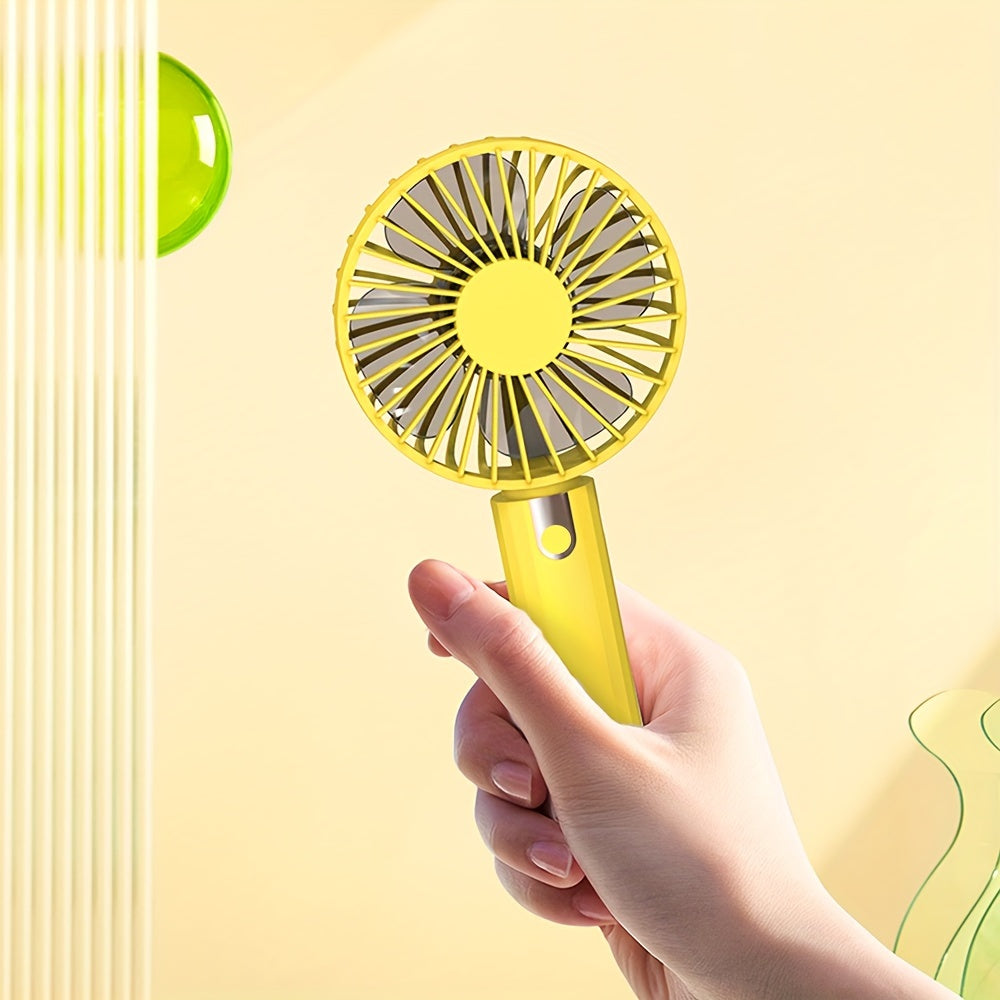 Stay cool anywhere with this lightweight, handheld mini fan that is ultra-portable and USB rechargeable. Perfect for office, outdoor activities, travel, and camping.