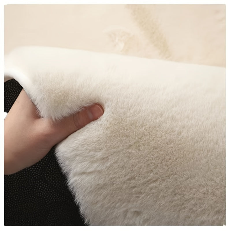 Redefine your space with our sumptuous Faux Rabbit Fur Area Rug. Indulge in its soft, plush texture that adds a touch of luxury to your living room, bedroom, or coffee table. Easy to care for, this rug is machine washable and fade-resistant, ensuring