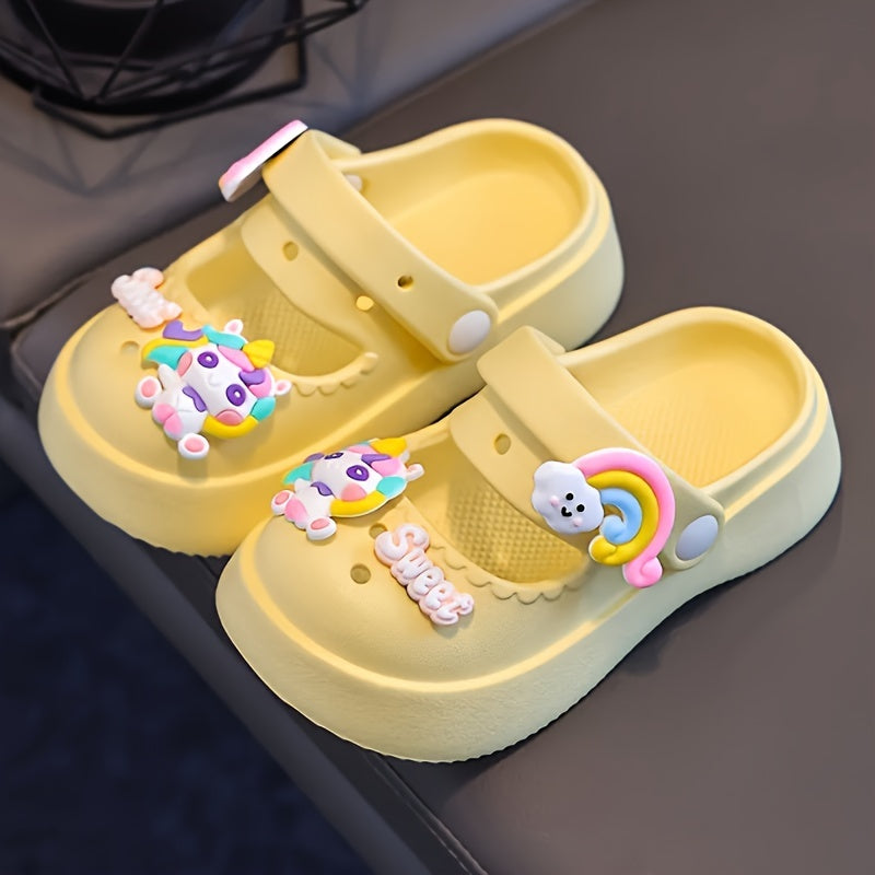 Girls' cartoon clogs in pink and white with charms, suitable for all seasons, indoor/outdoor use.