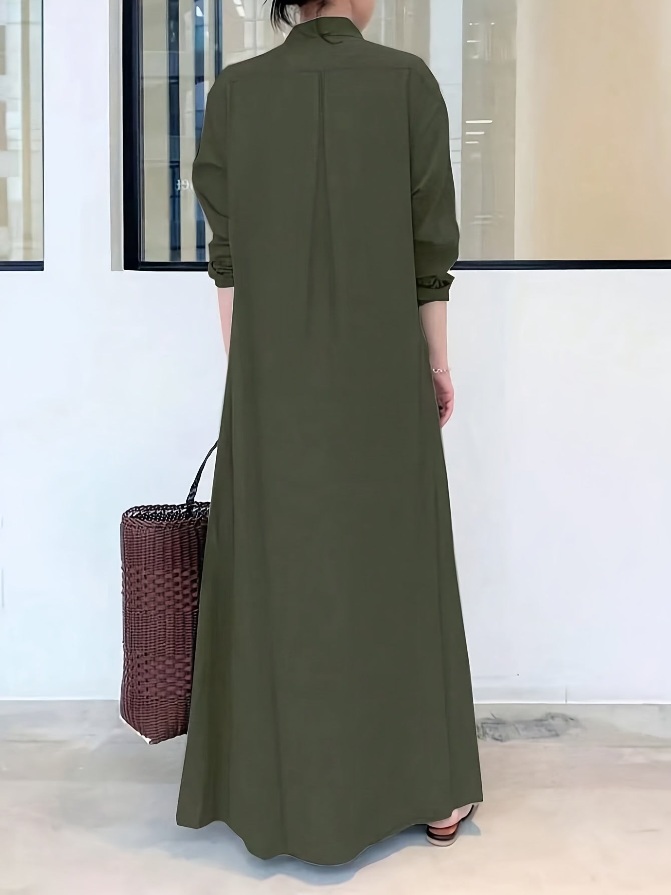 Button front shirt dress in solid color, loose fit maxi style with long sleeves for spring and fall.