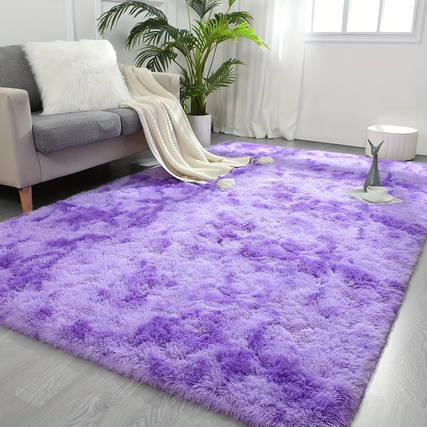 Luxurious Shag Area Rug: This modern plush fuzzy rug is perfect for adding comfort and style to any room. It is machine washable and non-shedding, making it ideal for use in the bedroom or as a bedside rug. The non-slip shaggy design is perfect for