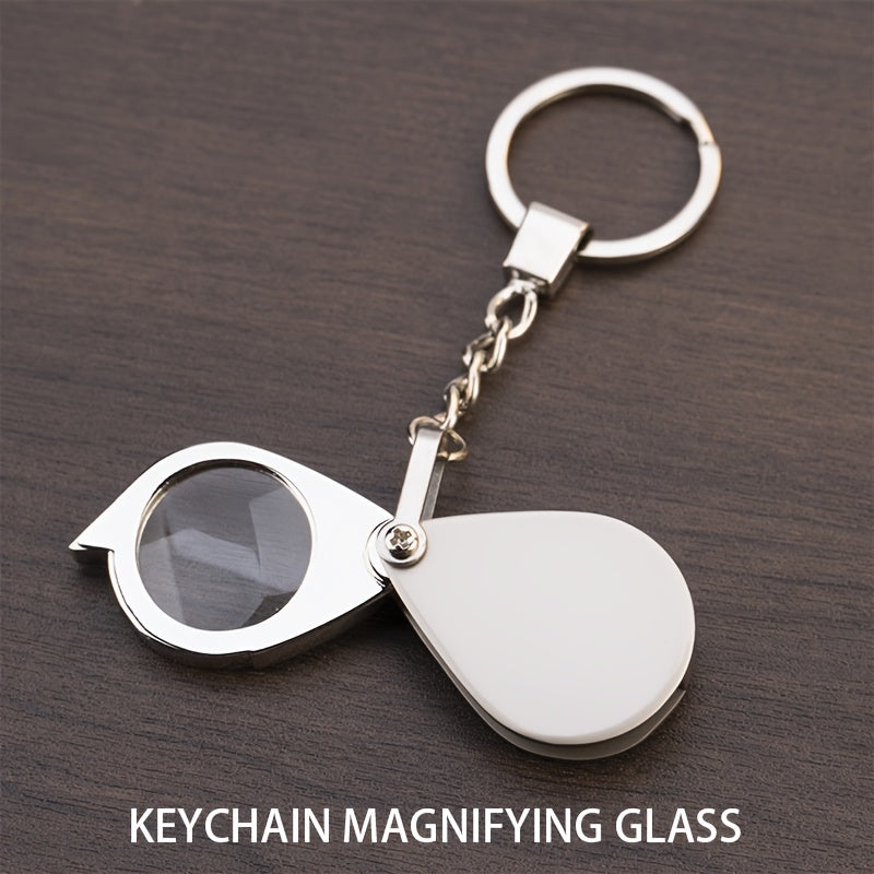 A premium gold keychain magnifying glass with high-definition glass, portable and foldable design perfect for reading small print.