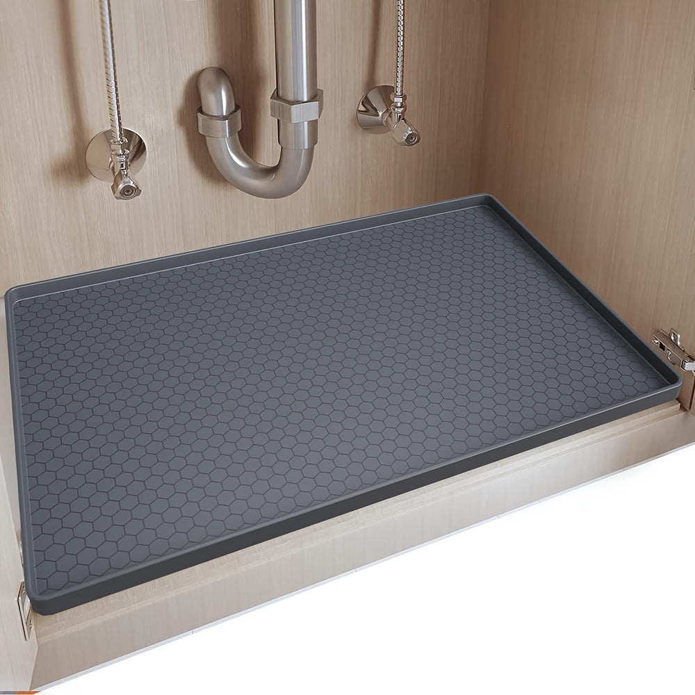 Essential kitchen organization accessory - Waterproof and anti-drip liner for kitchen and bathroom cabinets, measuring 71.12x48.26 cm - Flexible silicone under sink mat.