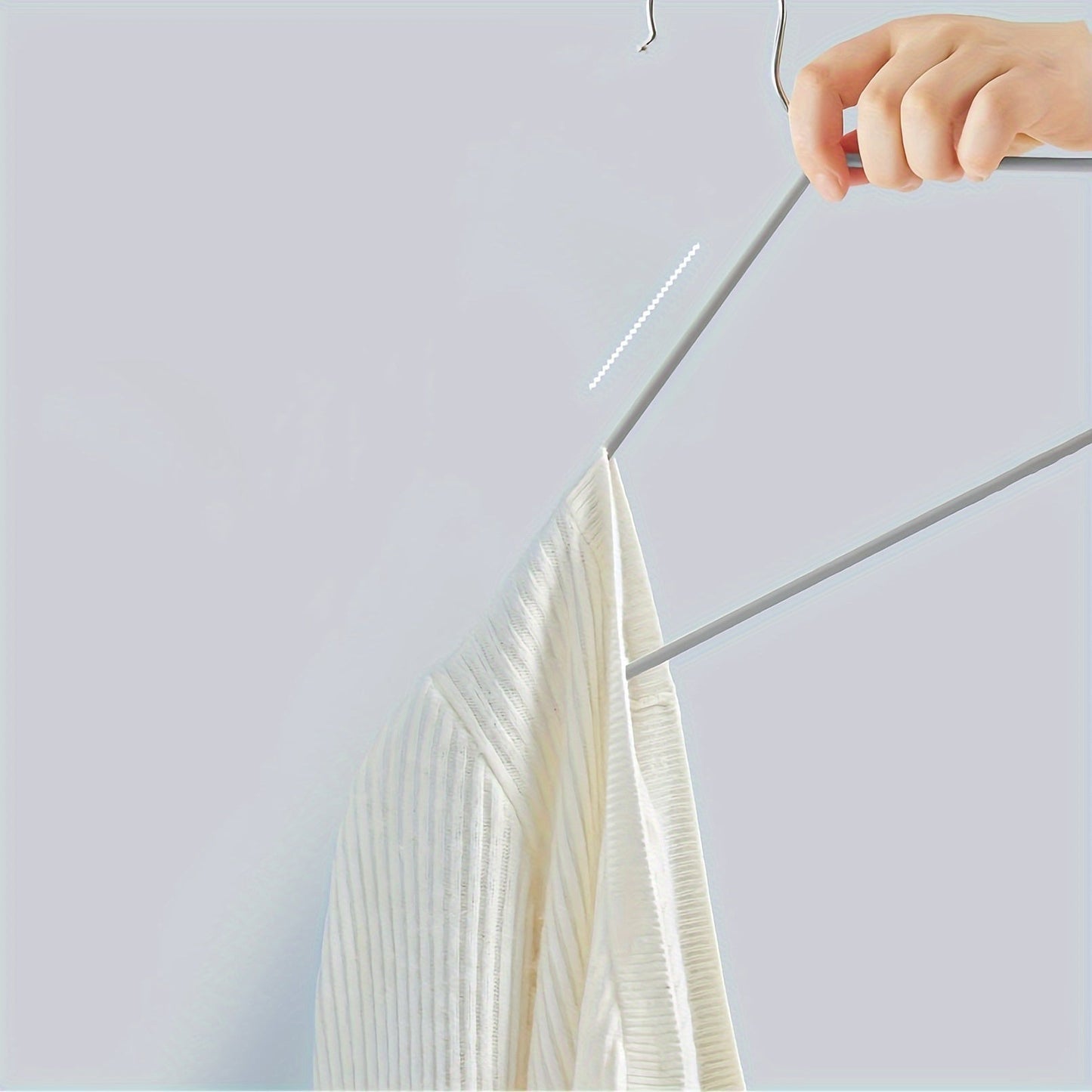 Get organized with this set of 30 heavy-duty non-slip metal coat hangers. Designed for efficiency and durability, these hangers are perfect for home or retail use. Save space and keep your clothes neatly organized with these sturdy hangers.