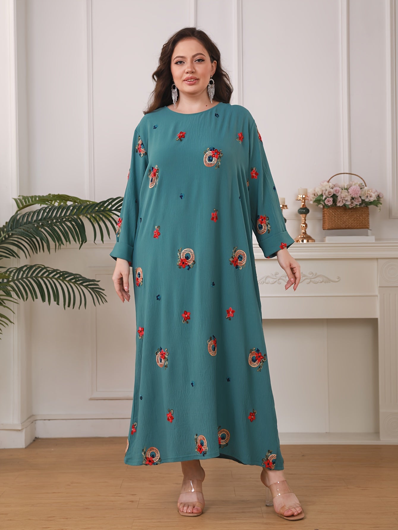 Elegant floral print women's plus size abaya with long sleeves and loose fit in traditional Middle Eastern style.