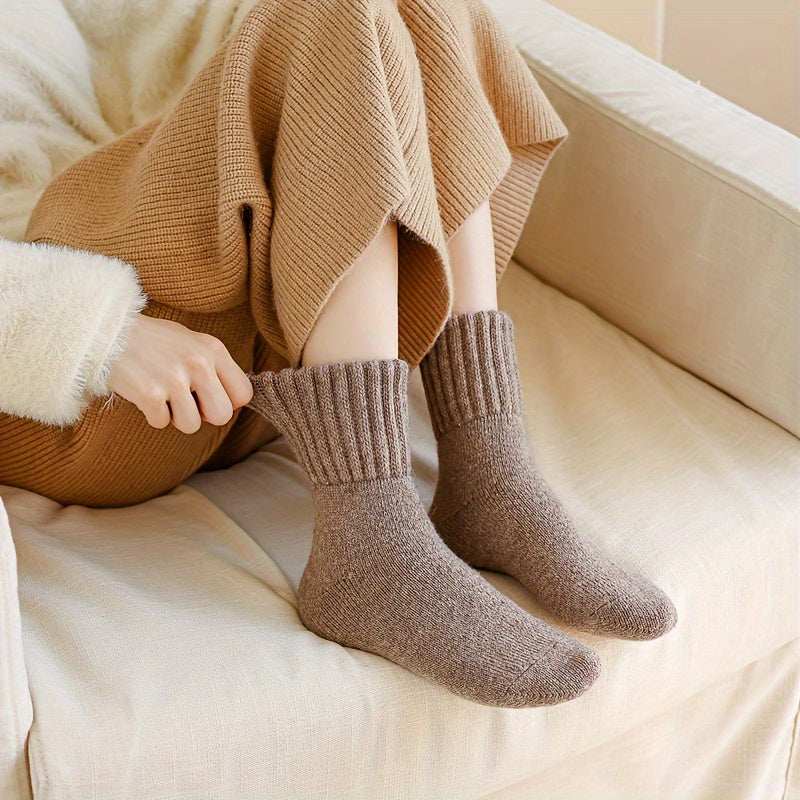 5 cozy winter socks for women in beige and brown, mid-calf length, soft polyester blend, ideal for cold weather.