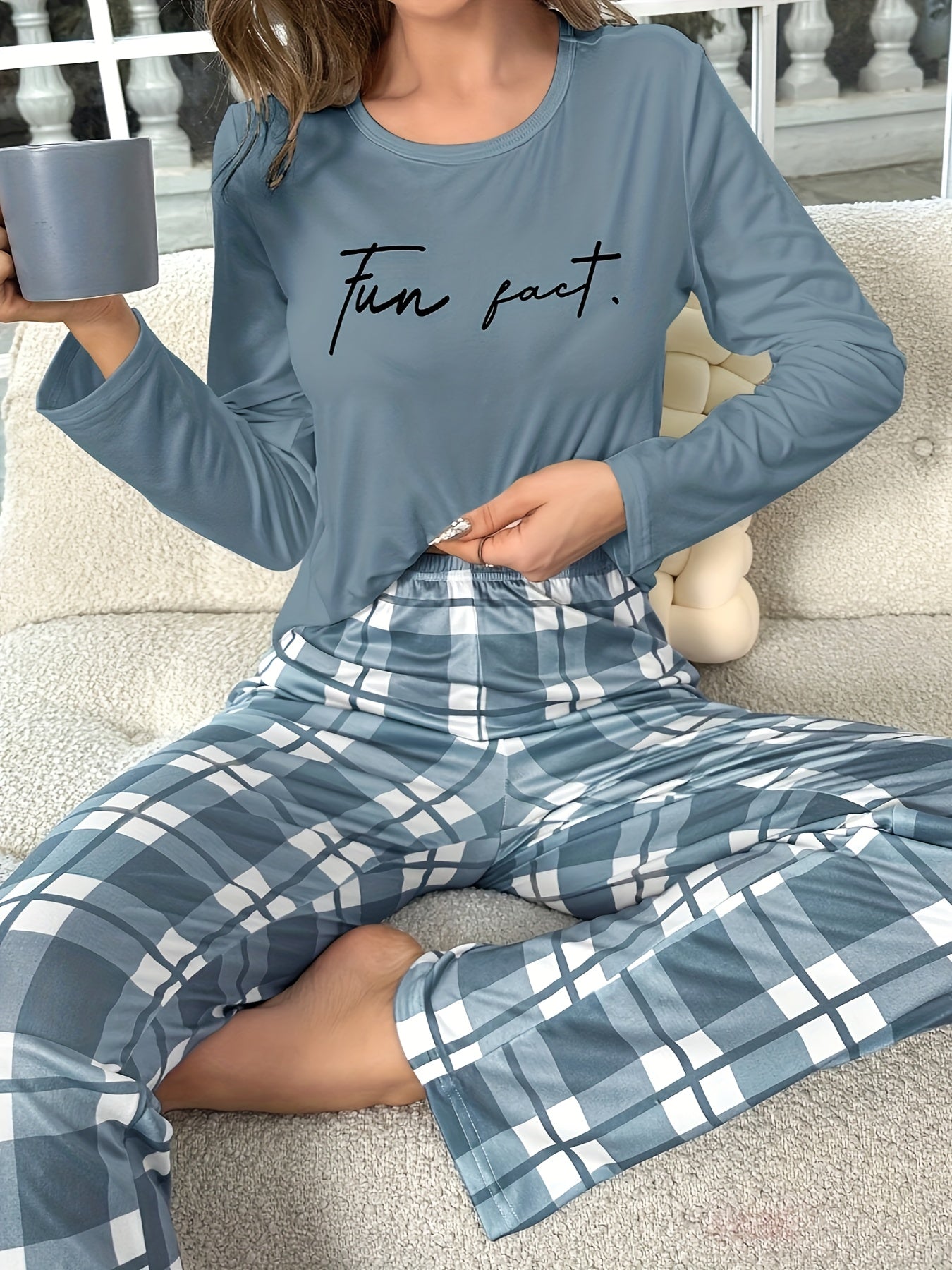 Women's casual sleepwear set includes a gray-blue slogan print long-sleeve top and plaid trousers.