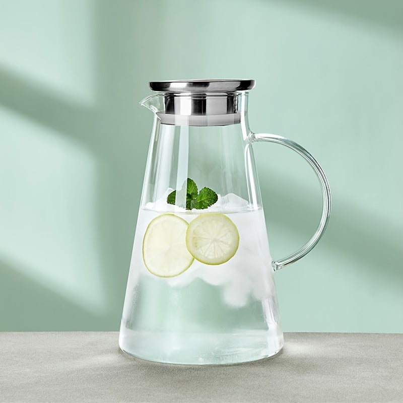 Heat resistant glass pitcher with lid, perfect for hot/cold drinks. Featuring a 1.8L clear beverage carafe with handle for easy serving. Ideal for home, restaurant, or office use. Easy to clean and makes a great gift for Christmas or New Year. A