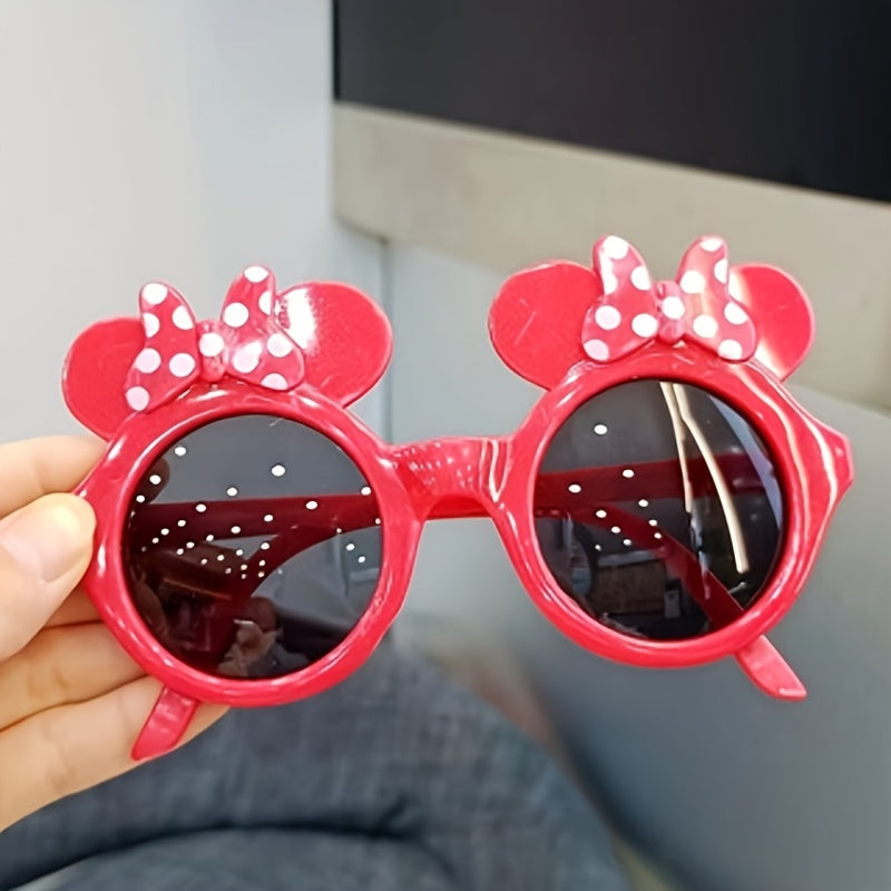 Minnie Mouse cat eye glasses in red and black with polka dot detail, perfect for women, made of plastic.