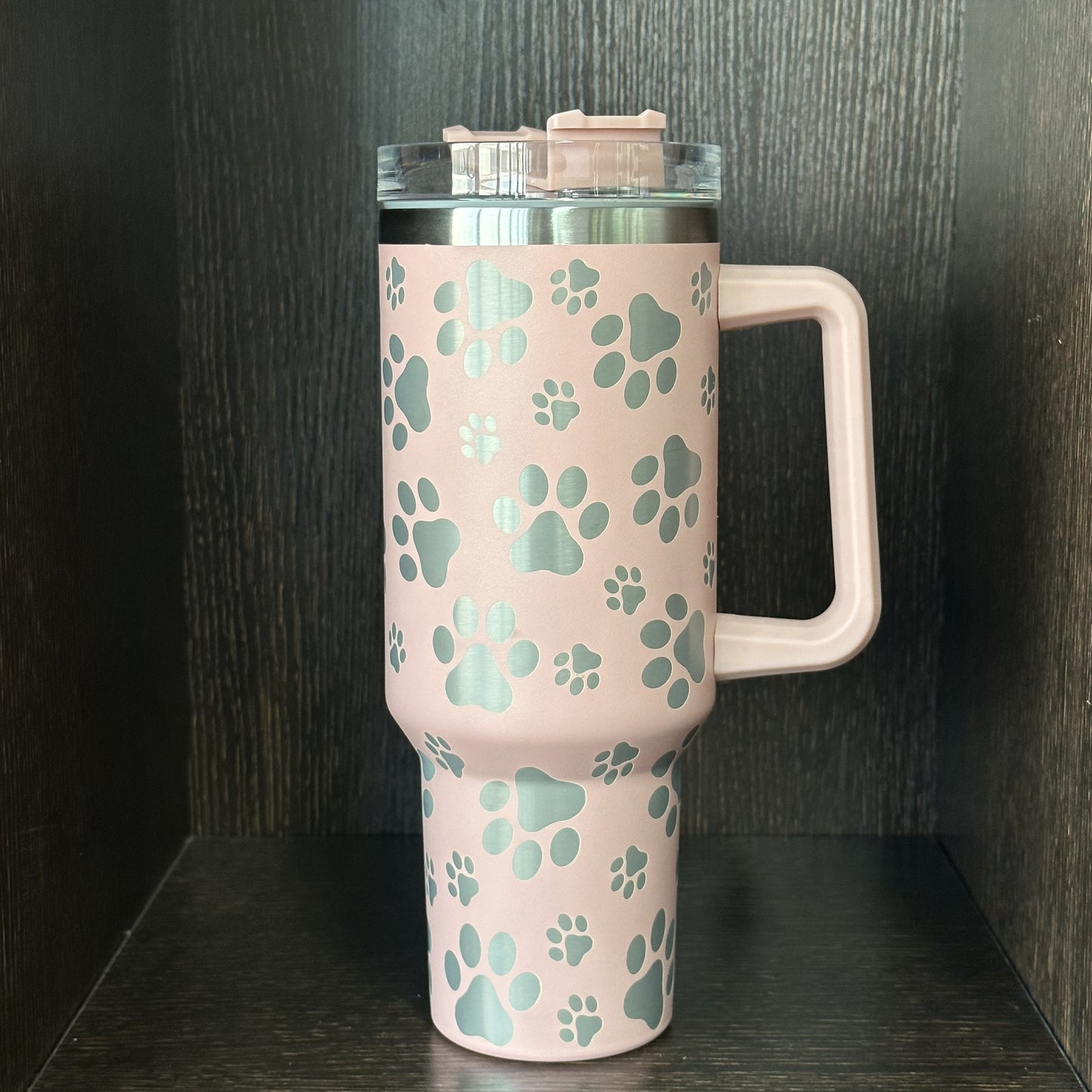 Insulated stainless steel tumbler with cat paw pattern, 40 oz. Double wall vacuum cup with lid and handle. Great for car travel and daily use. Perfect gift for cat lovers.